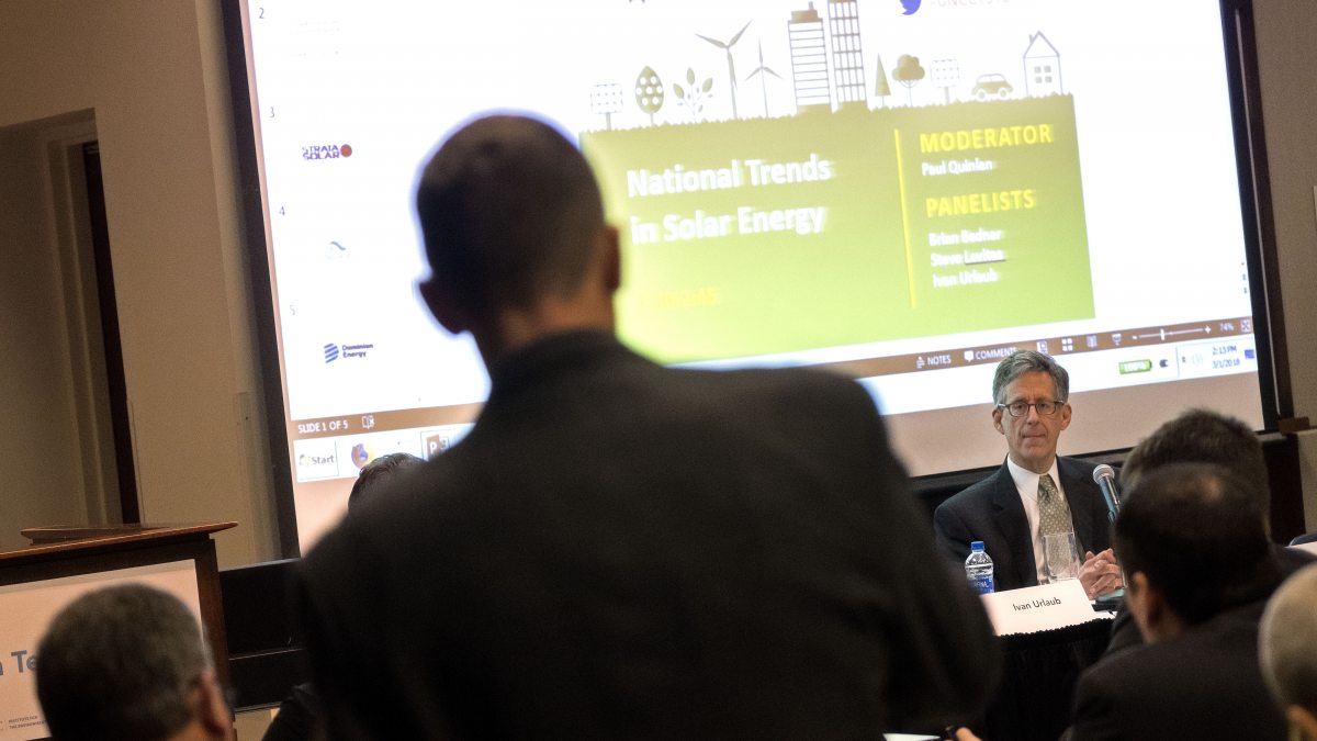 An audience member asks a quesiton at the Clean Tech Summit.