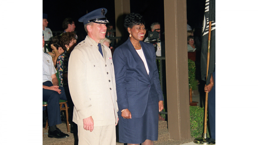 Ruby Butler DeMesme stands during a military ceremony.