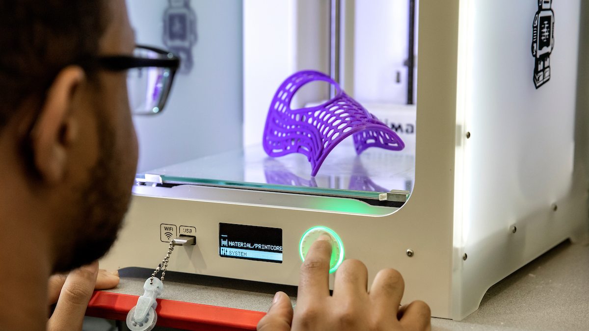 Purple plastic inside a 3D printer