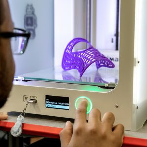 Purple plastic inside a 3D printer