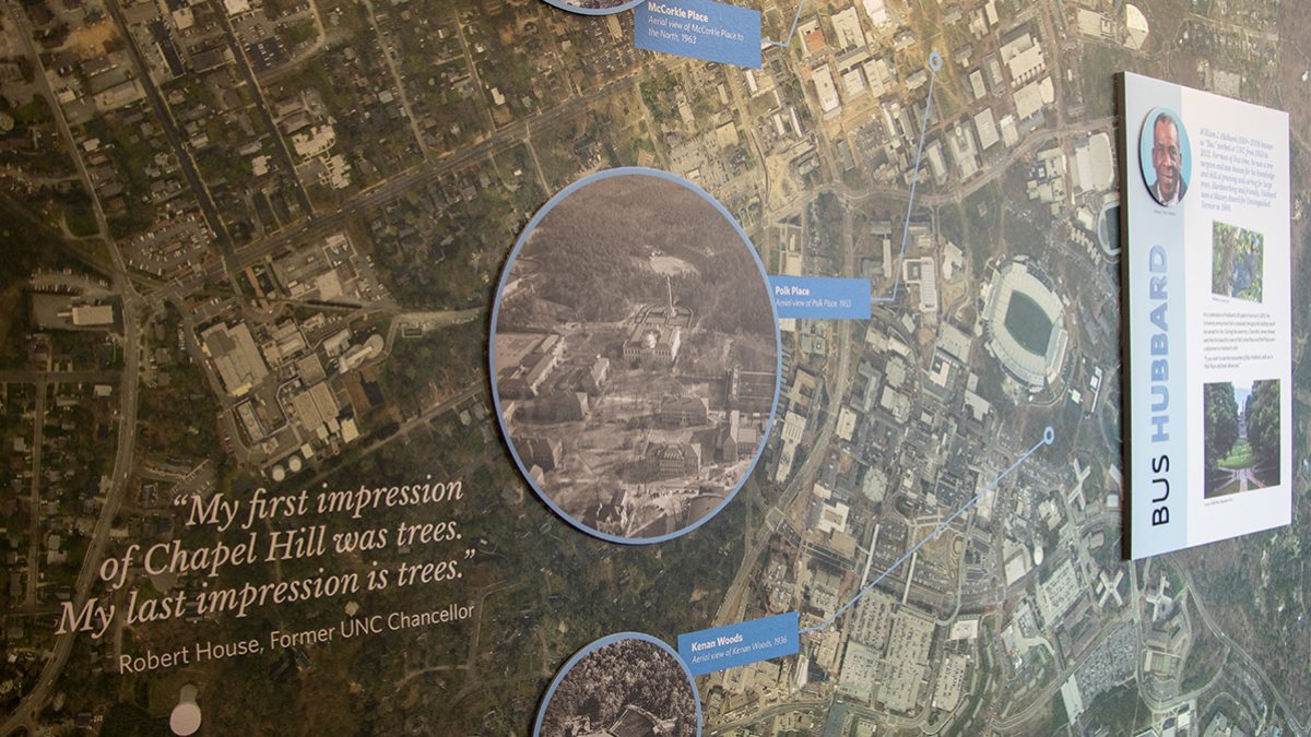 A photo of a map with photos of areas of trees magnified.