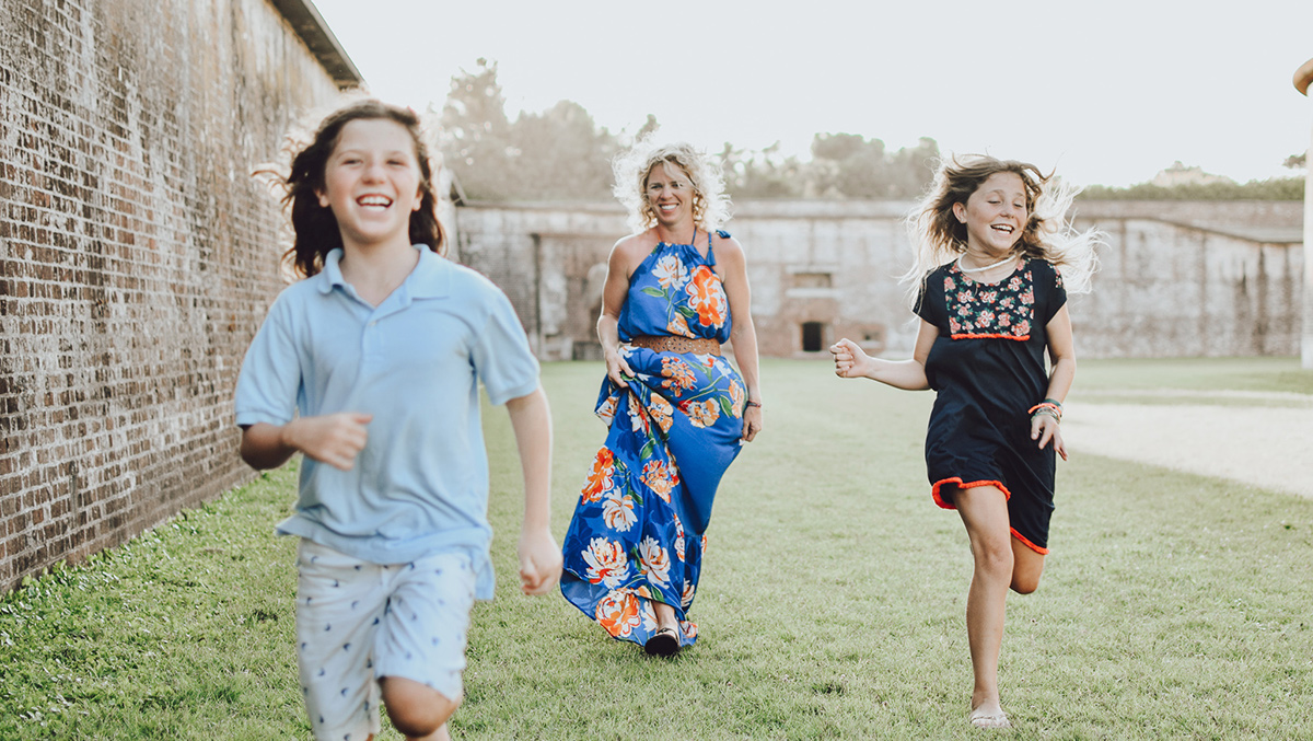 Becky Hoover running with her children.