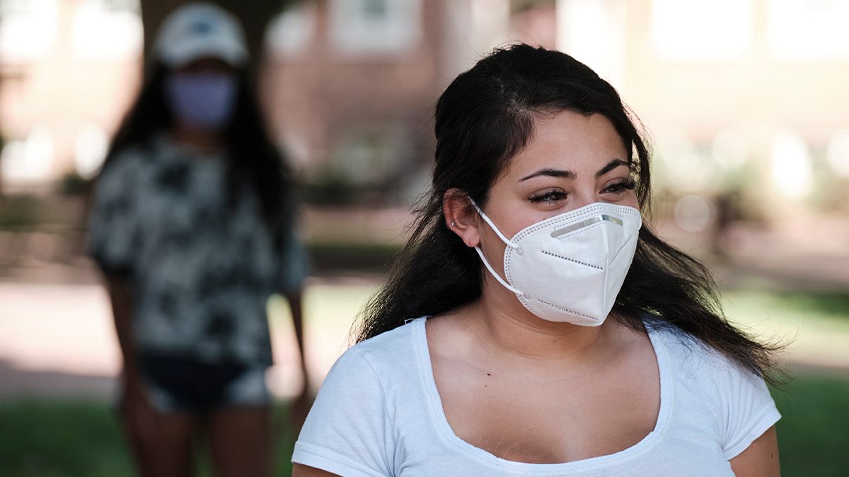 A female student wearing a face mask.