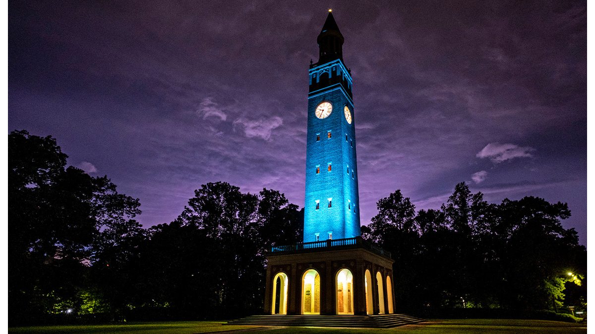 The Bell Tower lit up with blue lights.