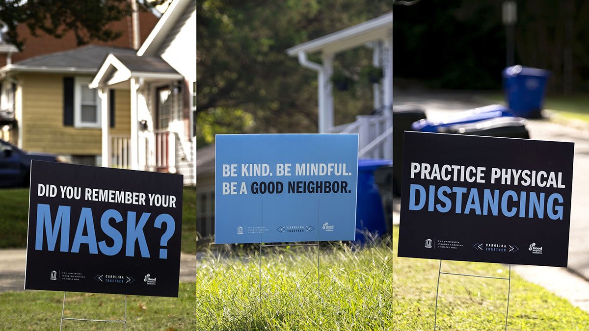 Yard signs encourage mask wearing and physical distancing