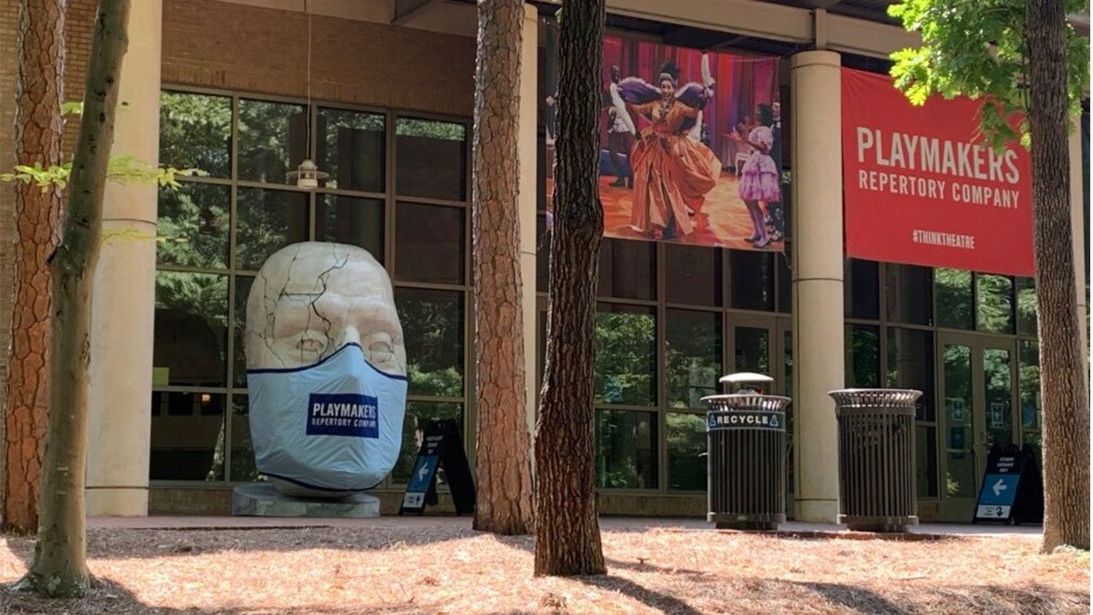 A masked statue of Caesar from PlayMakers Repertory Company’s production of “Julius Caesar” sits outside the Joan H. Gillings Center for Dramatic Art.