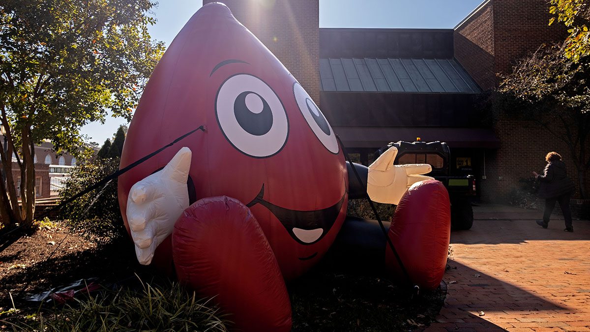 An inflatable blood drop outside.