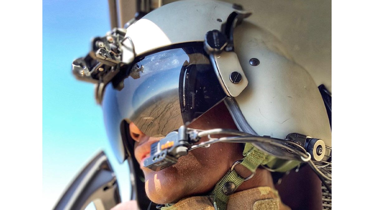 Lindsey Jefferies in the cockpit of a Black Hawk helicopter.