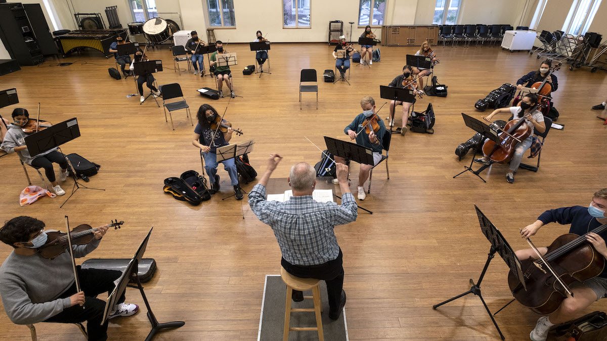 UNC Symphony Orchestra practices six feet apart on campus.