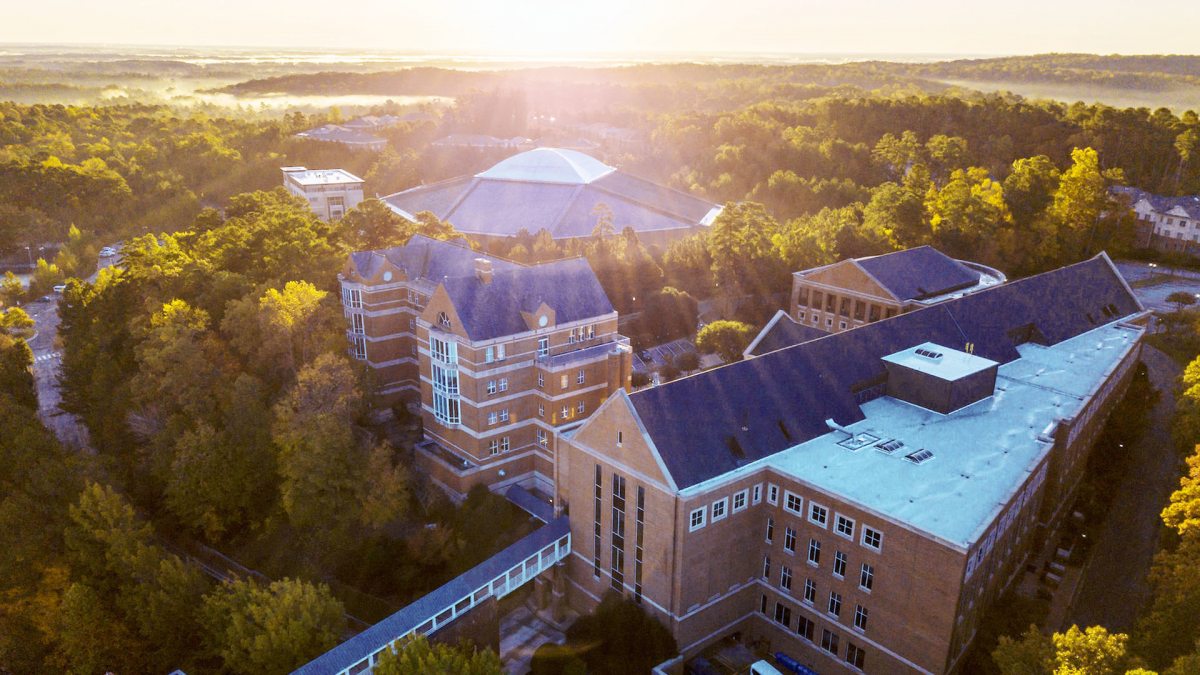 An aerial photo of the UNC Kenan-Flagler's two brick buildings.