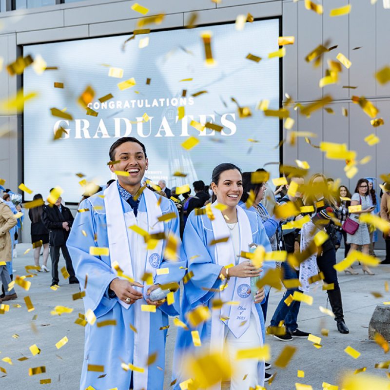Graduates celebrate with confetti