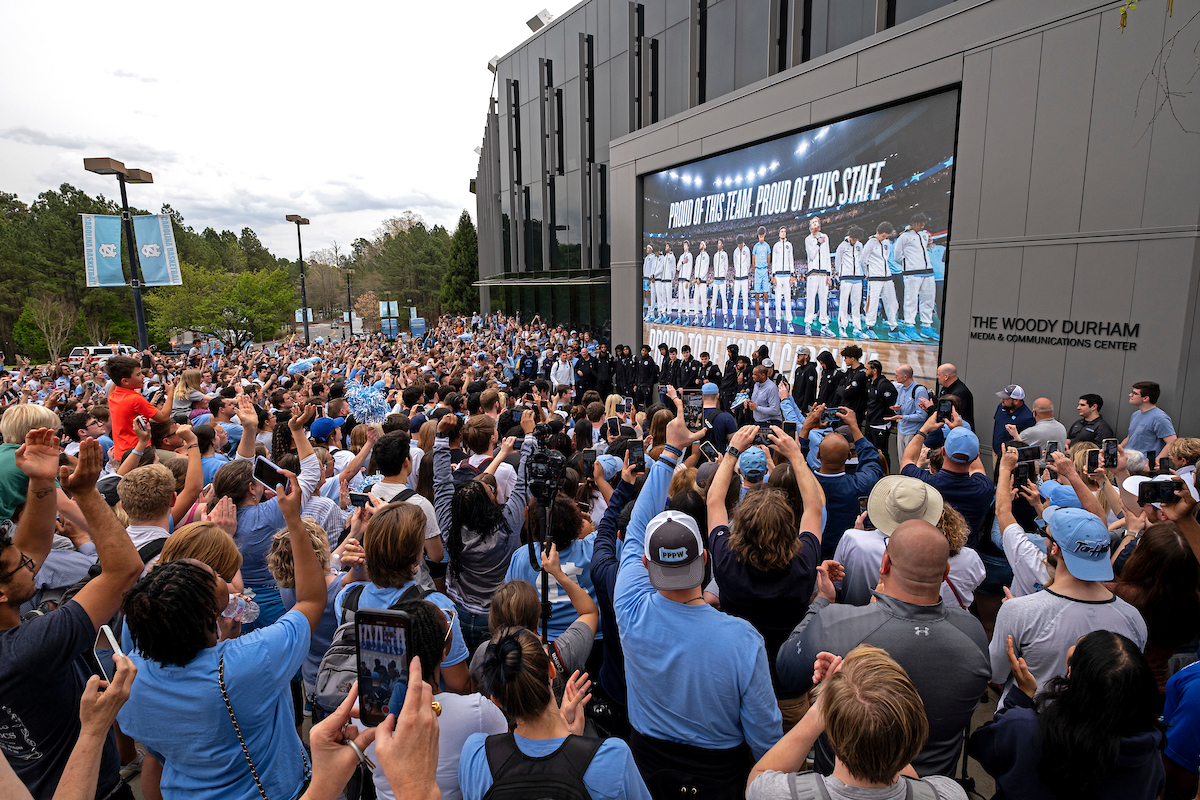 People standing around the Dean Dome.