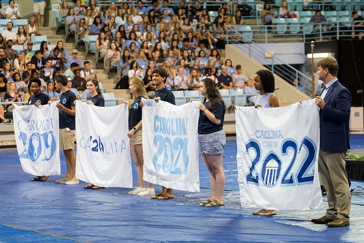 Students hold a Class of 2022 flag.