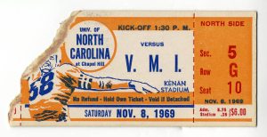 A ripped orange ticket stub with blue and red printing