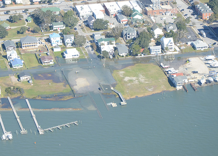An aerial view of a 2021 king tide that flooded docks and streets in the Promise Land section of Morehead City, North Carolina.