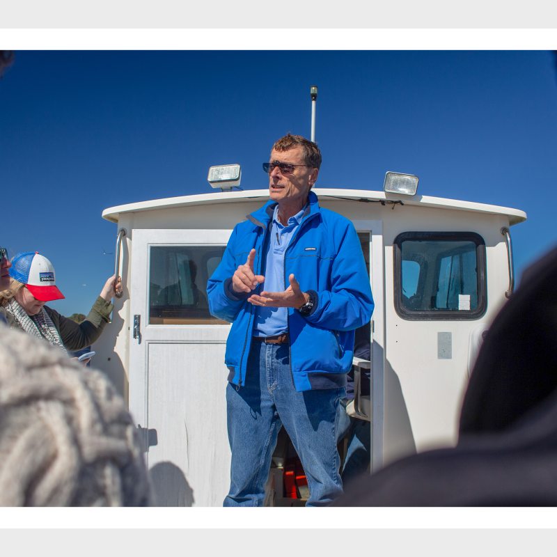 Rick Leuttich standing on a boat