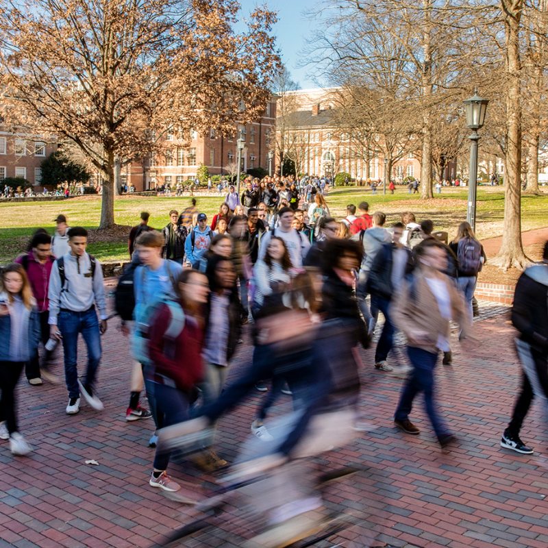 Students walking on Polk Place.