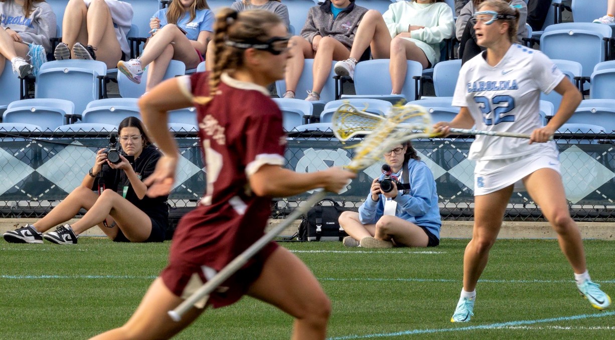 Sports Xtra reporters Mason Murr and Caroline Routh film a Carolina women’s lacrosse game against Boston College to feature on the twice weekly show. 