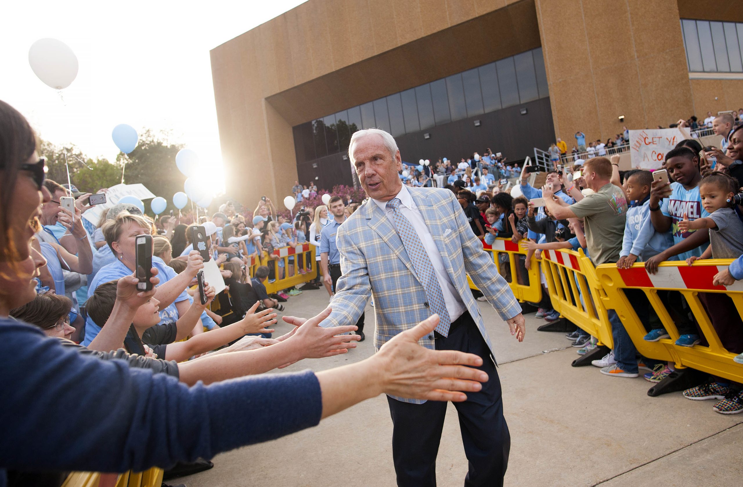 Roy Williams greeting fans outside the Dean Smith Center.