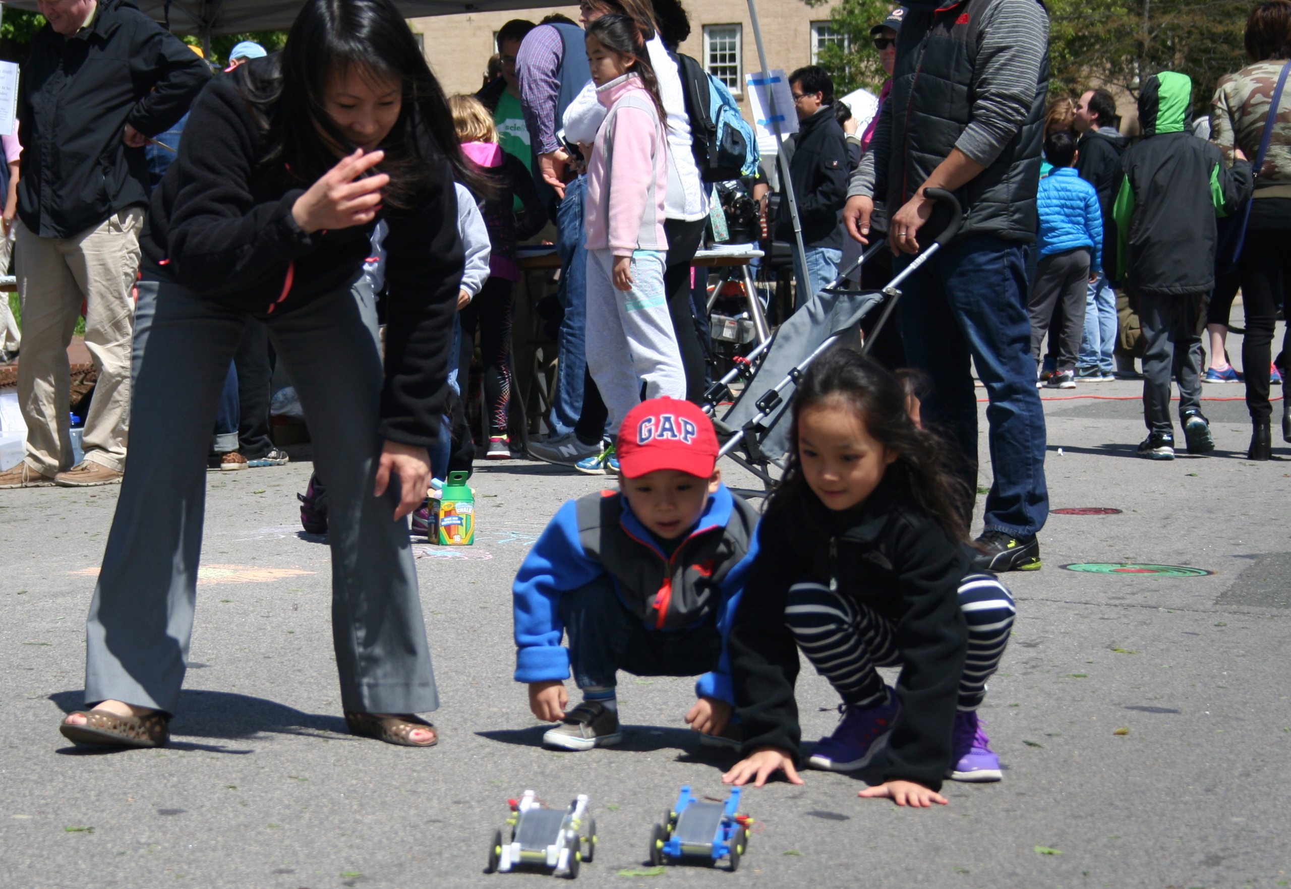 children with toy cars at UNC Science Expo