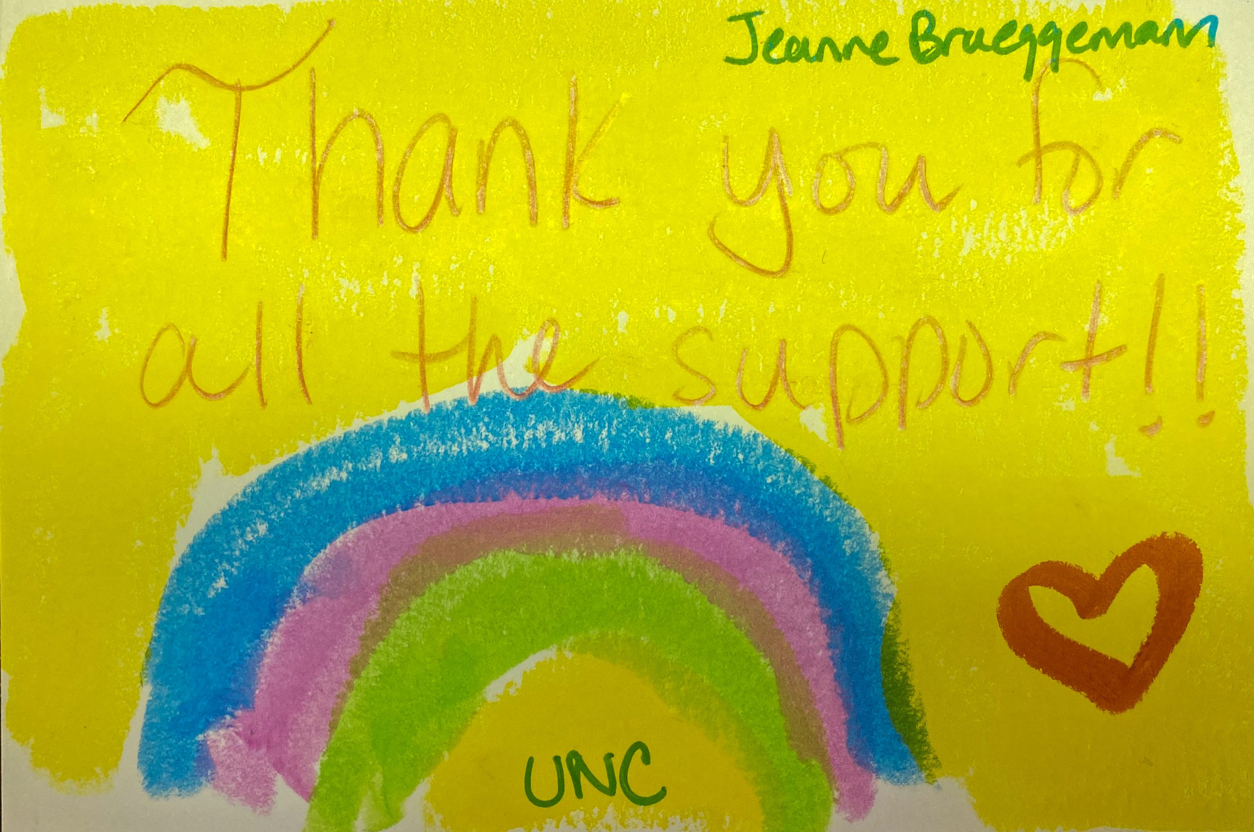 handpainted yellow postcard with a rainbow and text: Thank you for all the support, Jeanne Brueggemann
