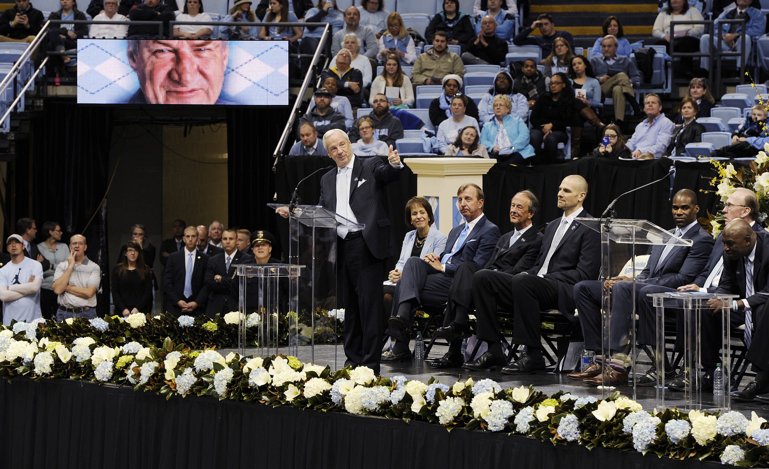 Roy Williams addressing a large crowd.