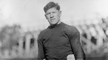 NC which indicates where Jim Thorpe played baseball prior to the 1912 Olympics|Jim Thorpe playing for the New York Giants in 1913.