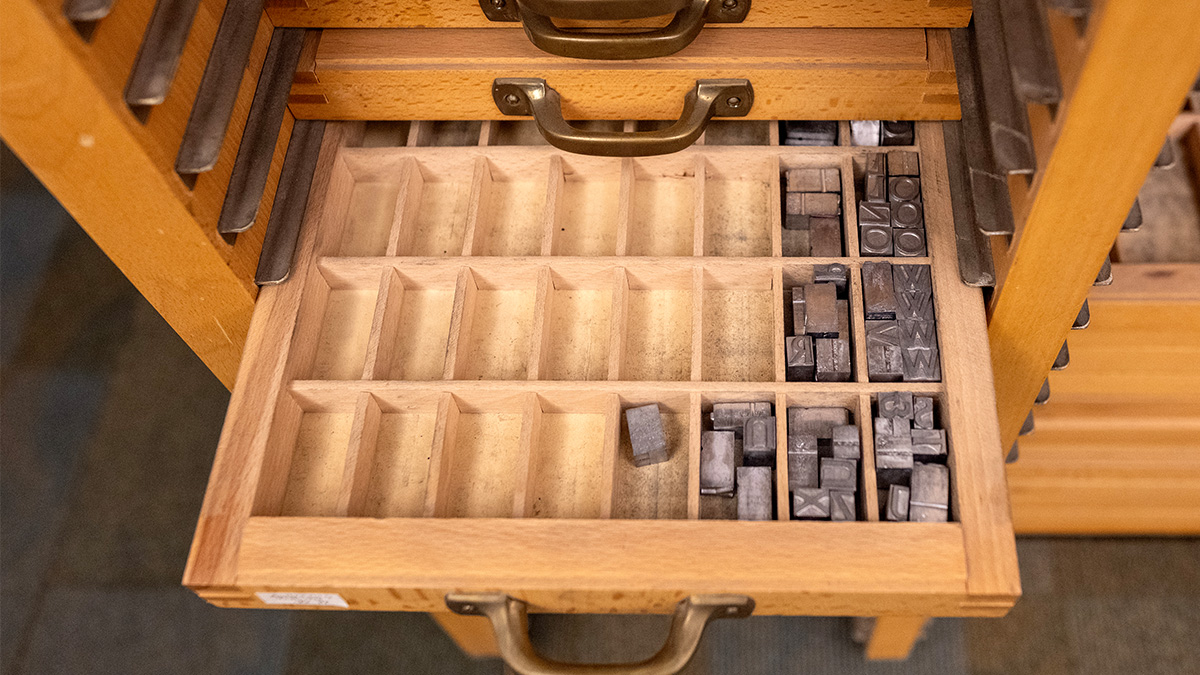 Assortment of type faces in a drawer. 