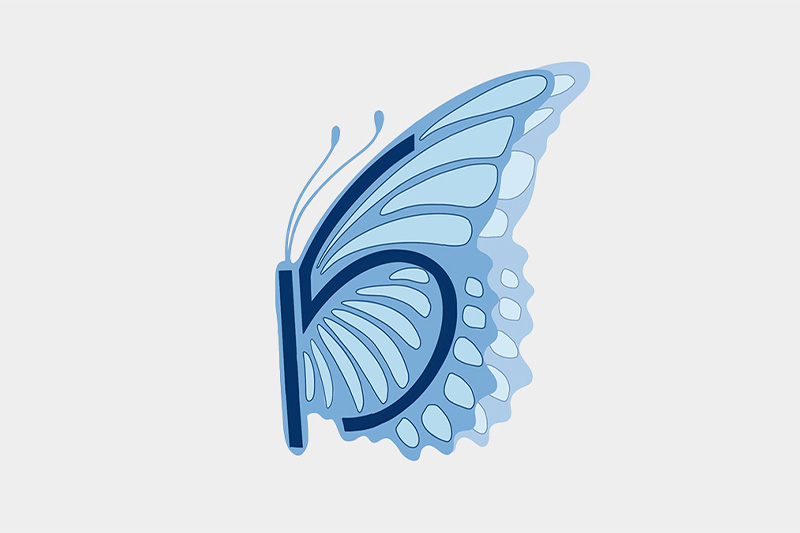 The 15th anniversary logo of the Eve Carson Scholarship. The logo is a buttlerfly and its wings with various shades of blue, ranging from Carolina Blue to Navy Blue. Highlighted in Navy is "15".