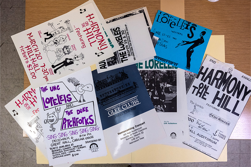 Posters advertising student group activities from decades ago.