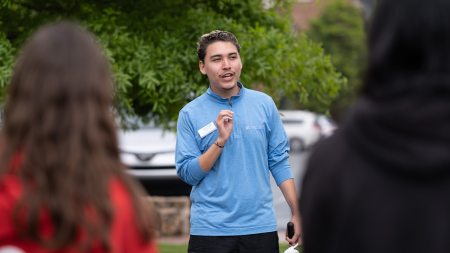 Kevin Rivera-Araujo speaking to visitors as he gives a tour of UNC-Chapel Hill.